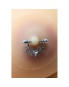Paire de cache-tétons ornés d’un piercing barre en demi-anneau avec strass, pour peau claire. 